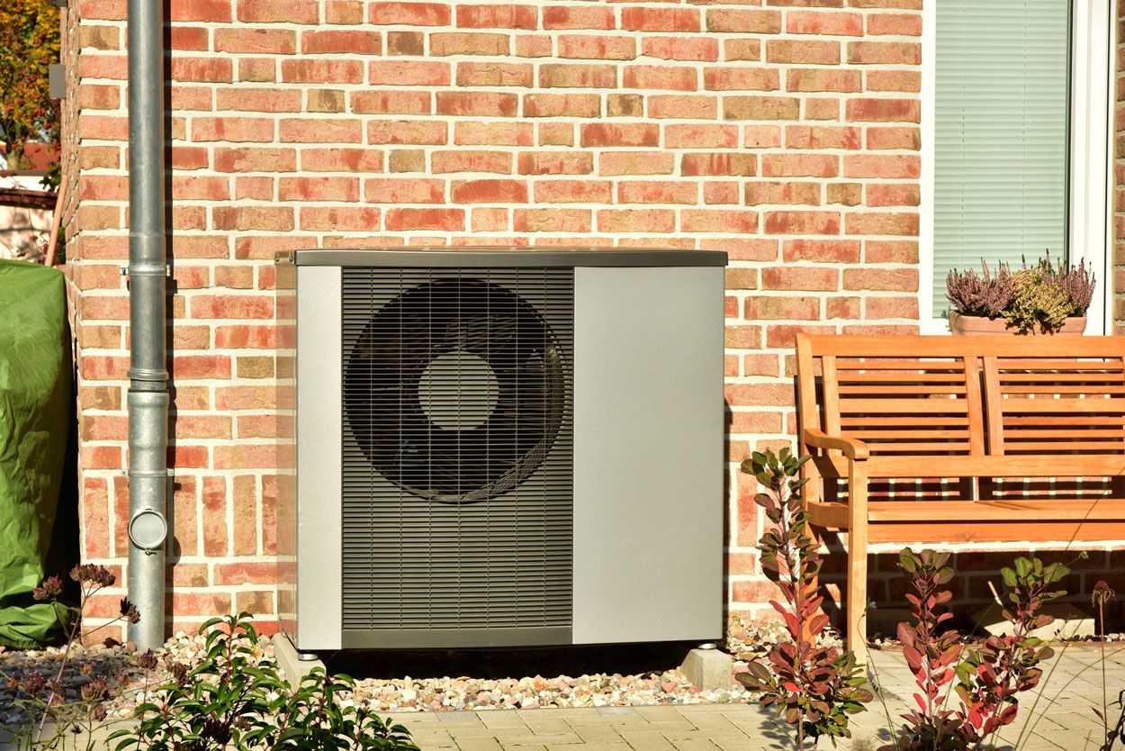 Air Sourced Heat Pump Outside Home